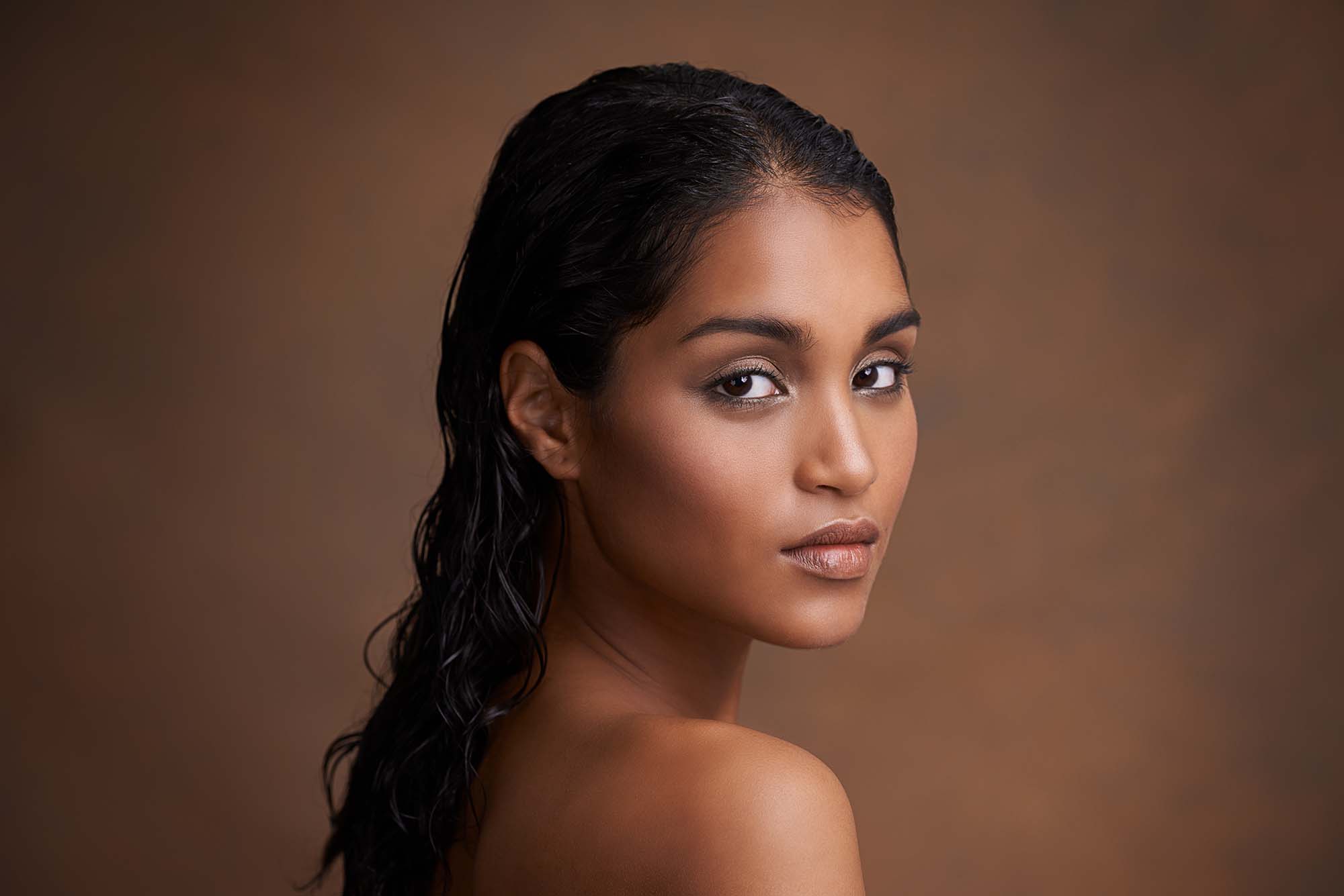 beautiful young woman with radiant face Achieving a radiant face with microneedling at Body Soul Nutrition Regenerative Institute.