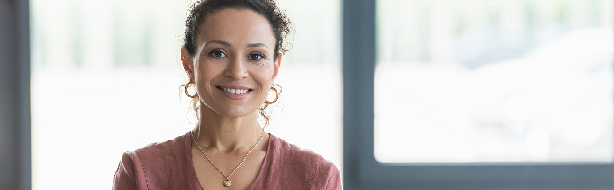 Woman feeling balanced and positive with hormone therapy at Body Soul Nutrition Regenerative Institute.